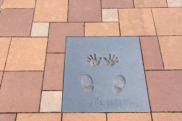 Astro Boy’s handprints in front of the museum