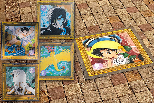 Tezuka manga characters on the pavement